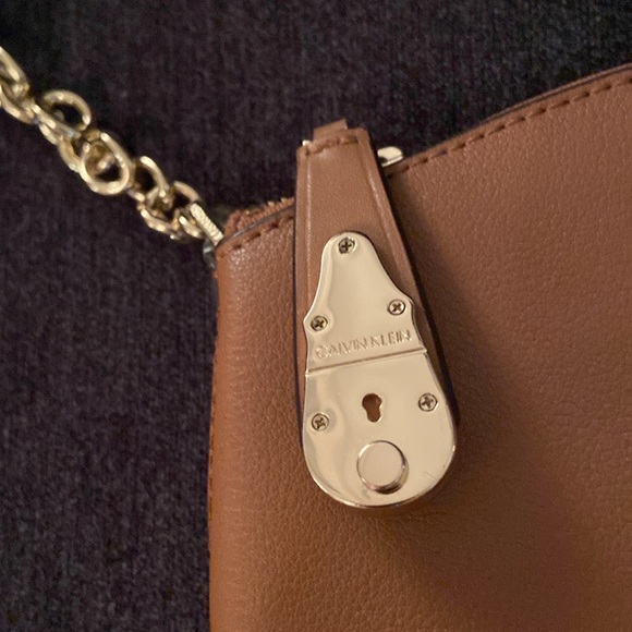 Brown, adjustable crossbody, Calvin Klein purse with gold hardware. - Picture 4 of 12